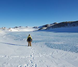 Pete standing on frozen freshwater lake