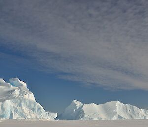 A landscape photo of sea ice and icebergs being an expeditioner’s 50,000 photo for the year
