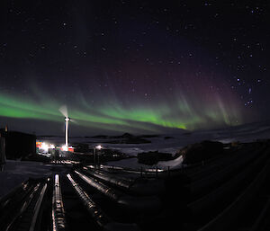 Wednesday morning’s aurora with the wind turbine, the red Sleeping Medical Quarters and Site Services and the saucepan (Orion) visible in the sky