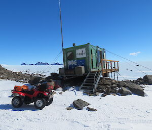 Looking west towards the David range with quad bikes and Rum Doodle field hut in the foreground