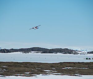 The plane in the air after a very short take off after one hour at Mawson