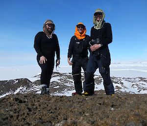 Three expeditioners a the top of Ufs island