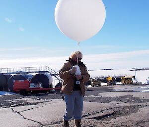 Anders standing with balloon