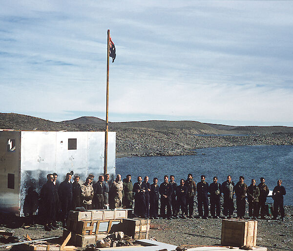 Flag being erected at Davis in 1957