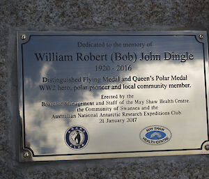 A close-up view of the memorial plaque.