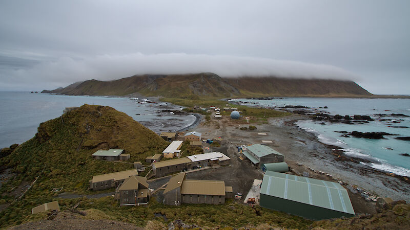 View of buildings on Macquarie Island from above.
