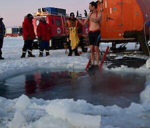 Person on edge of ice pool