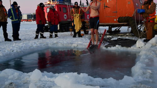Person on edge of ice pool