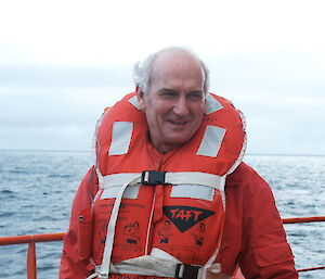 Man wearing lifejacket on ship
