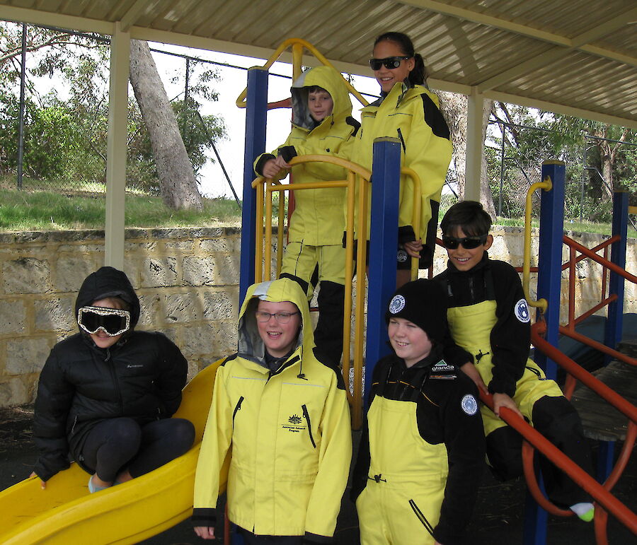 School students trying on Antarctic clothing