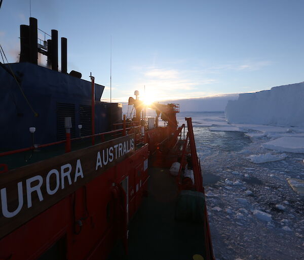 The Aurora Australis icebreaker beside the edge of the Totten Glacier.
