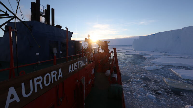 The Aurora Australis icebreaker beside the edge of the Totten Glacier.