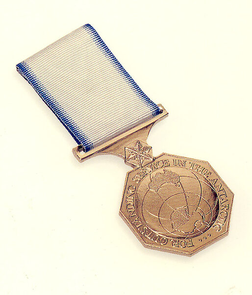 This bronze medal shows a map of Antarctica and the words ‘For outstanding service in the Antarctic'