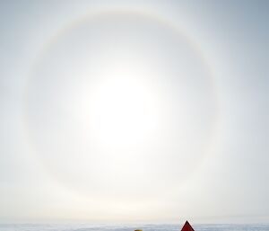 Solar halo dwarfing the tents at the Aurora Basin North ice core drilling campsite