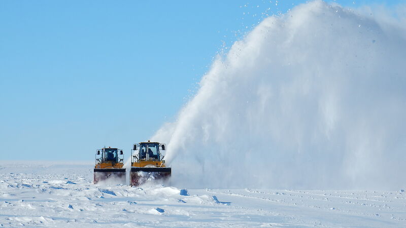 Snow blowers at work on the Wilkins runway