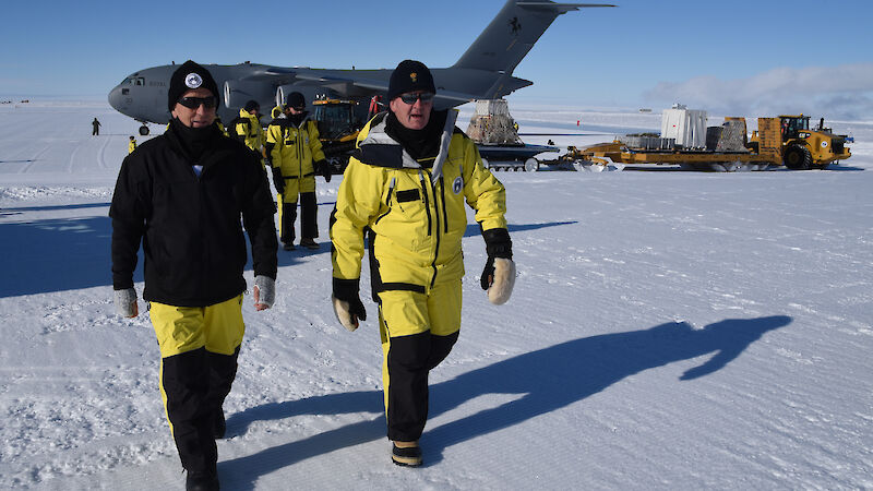The Governor General (right) and Australian Antarctic Division Director Dr Nick Gales at Wilkins Aerodrome with the C17-A aircraft behind them.