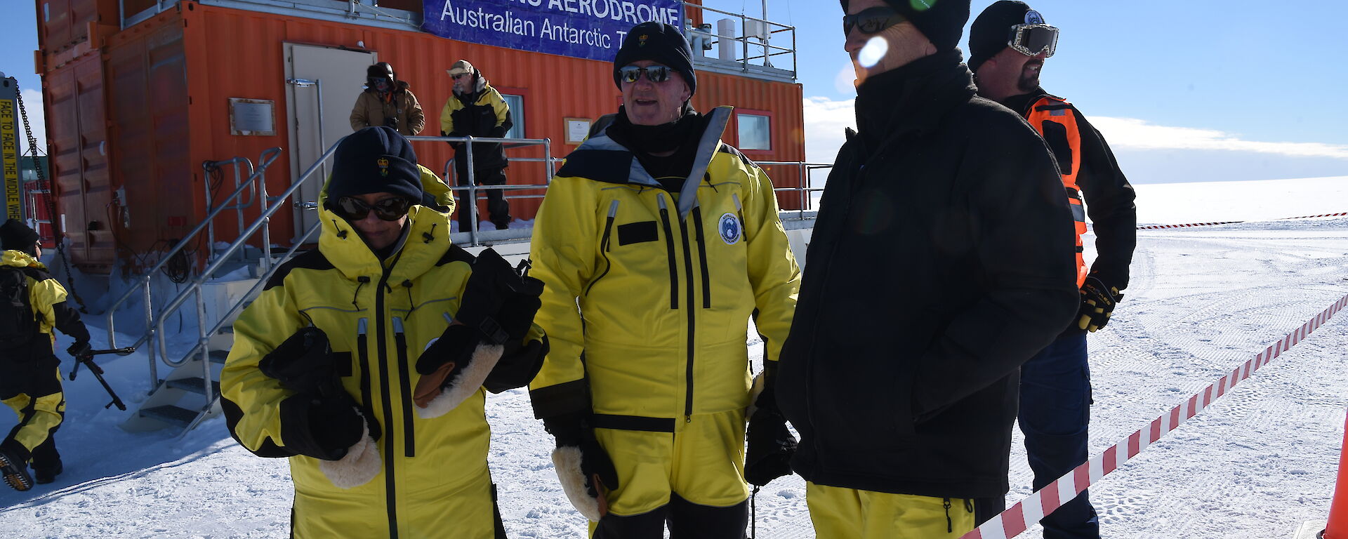 The Governor General and Lady Cosgrove in front of the main building at Wilkins Aerodrome.