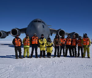 The Governor General (fourth from left) and Lady Cosgrove with the Wilkins Aerodrome crew in front of the C17-A aircraft.