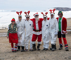 Expeditioners dressed as Santa and reindeers
