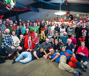 Group photo of people dressed in festive costumes.