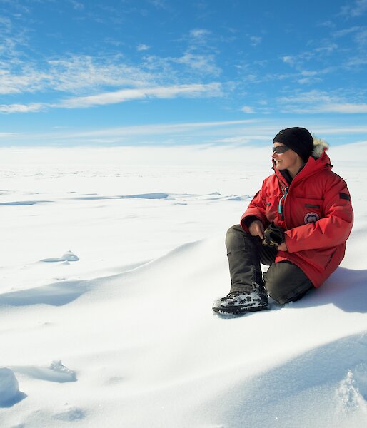 Expeditioner looking out across the Antarctic ice