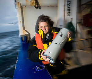 Australian Antarctic Division’s Susie Calderman deploying a sonobuoy