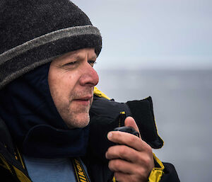 Australian Antarctic Division Science Leader, Dr Mike Double, observing blue whales
