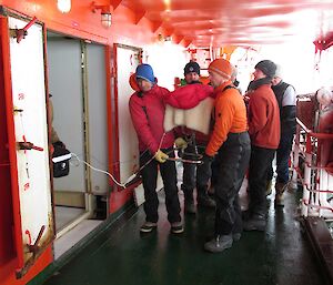 The patient being transferred to the Aurora Australis
