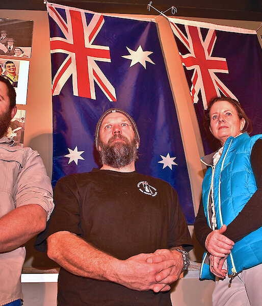 Davis station expeditioners in front of an ANZAC display on station. Current and ex defence personnel at Davis, from left to right Marc Mills (ex Army), Dennis Bormann (ex Army), Jan Wallace (current Army) and William Seal (ex RAAF).