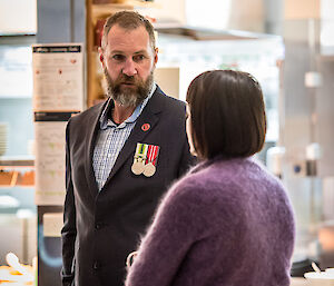 Ex-serviceman Dean A debriefs on the day with the station doctor