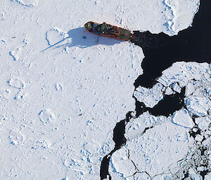 An aerial view of the Aurora Australis in the sea ice