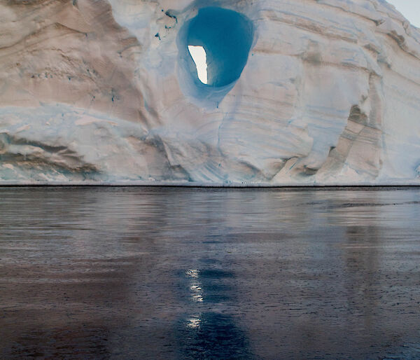 An iceberg with a hole through its centre