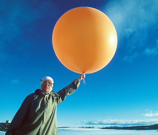 Launching a weather balloon.