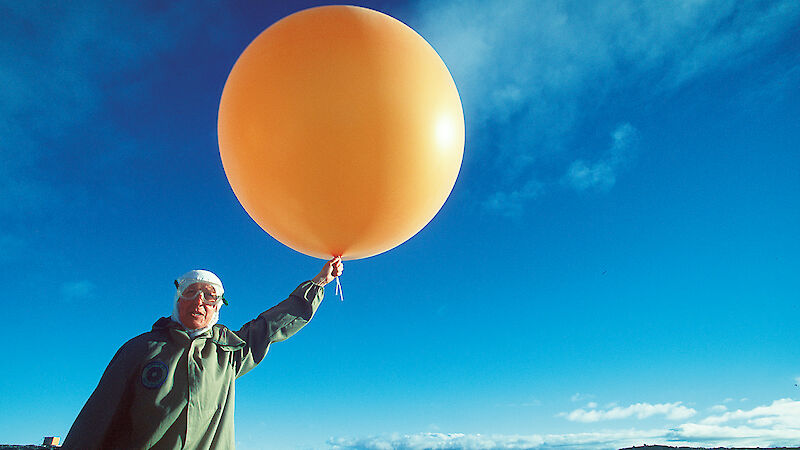 Launching a weather balloon.