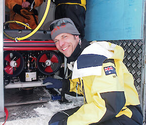 Dr Klaus Meiners with the Remotely Operated Vehicle (ROV) in Antarctica, which will be used to investigate the under-ice environment and algae growth in the fast-ice zone in Antarctica.