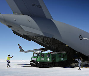 A Hägglunds over-snow vehicle unloaded at Wilkins