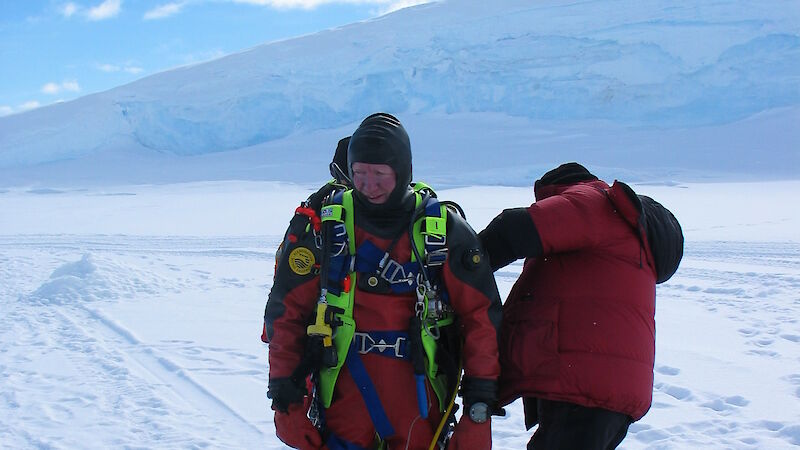 Divers prepare to enter the chilly Antarctic waters