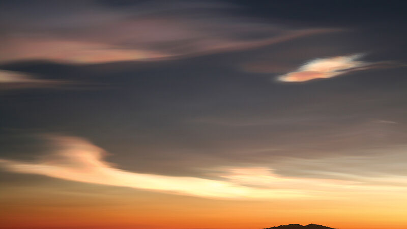 Nacreous clouds or ‘mother of pearl’ clouds photographed in the sky over Mawson, Antarctica.