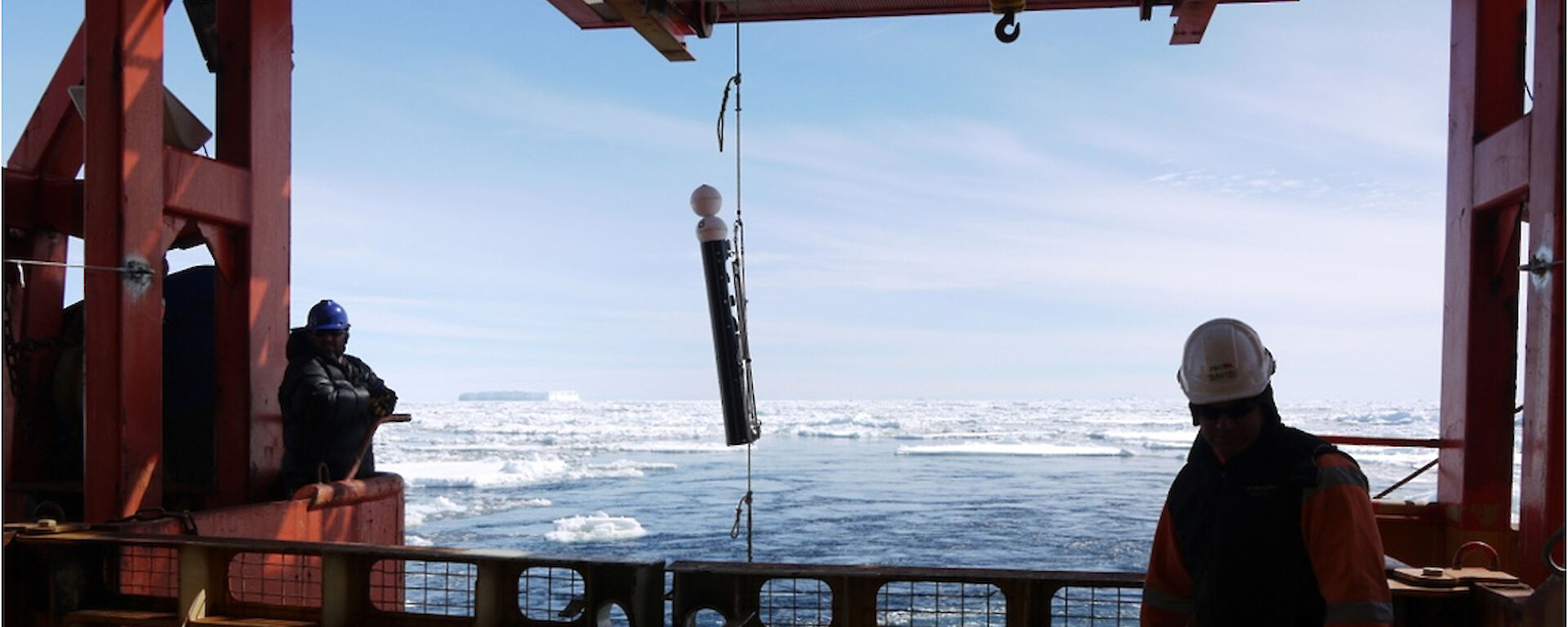 A camera system designed to be attached to longline gear is deployed off the back of a ship.