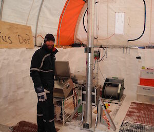 Drilling the main ice core inside a tent.