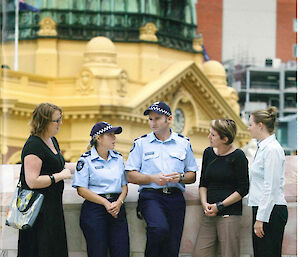 Steve Robertson (centre) doing some community policing in Melbourne.