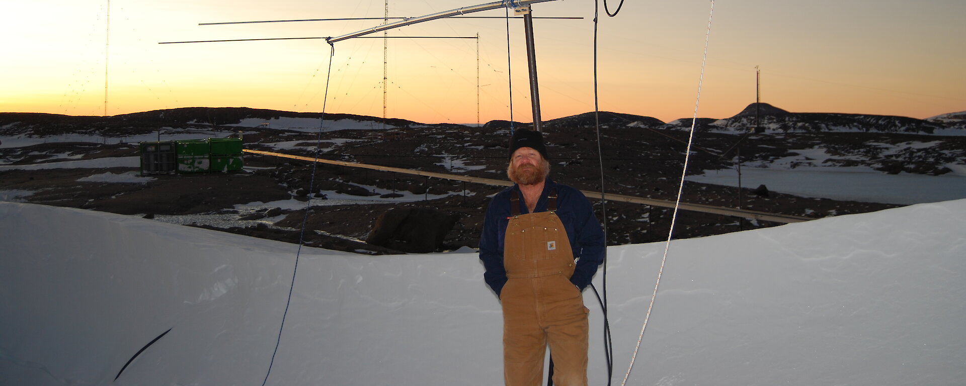 Craig with his radio antenna at Mawson station