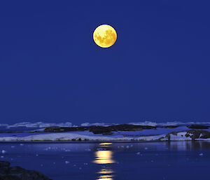 A moon rise in Antarctica.