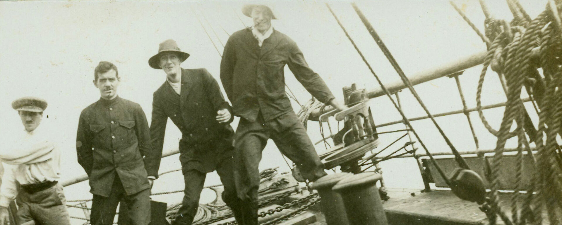 Xavier Mertz, H. Corner, Percy Gray and Belgrave Ninnis aboard the Aurora.