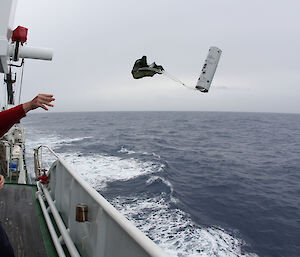 Lead acoustician Dr Brian Miller deploying a sonar buoy