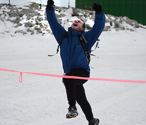 Made it! Gavin Melgaard crossing the finishing line at Casey station.