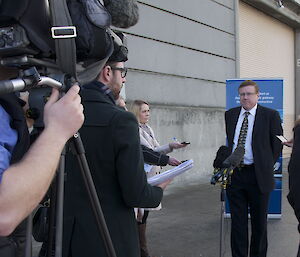 The Antarctic Division’s Dr Rob Wooding speaking with the media