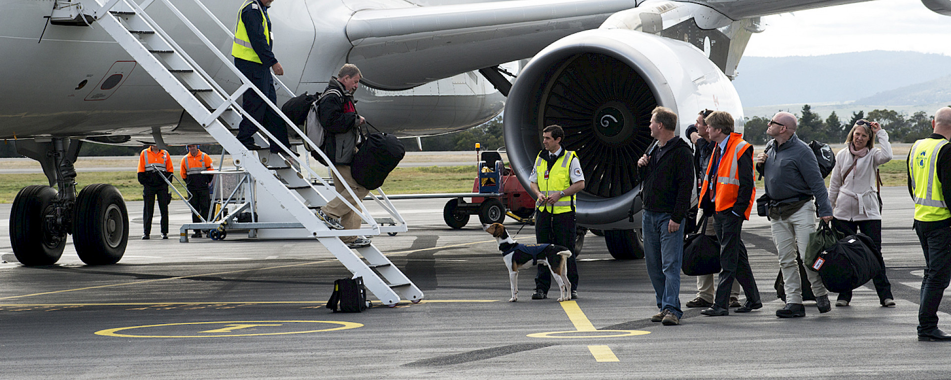 The Australian medical team step off the A319 at Hobart airport