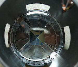 The reflective prism at the bottom of the light trap