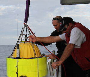 Dr Brian Miller deploying acoustic mooring